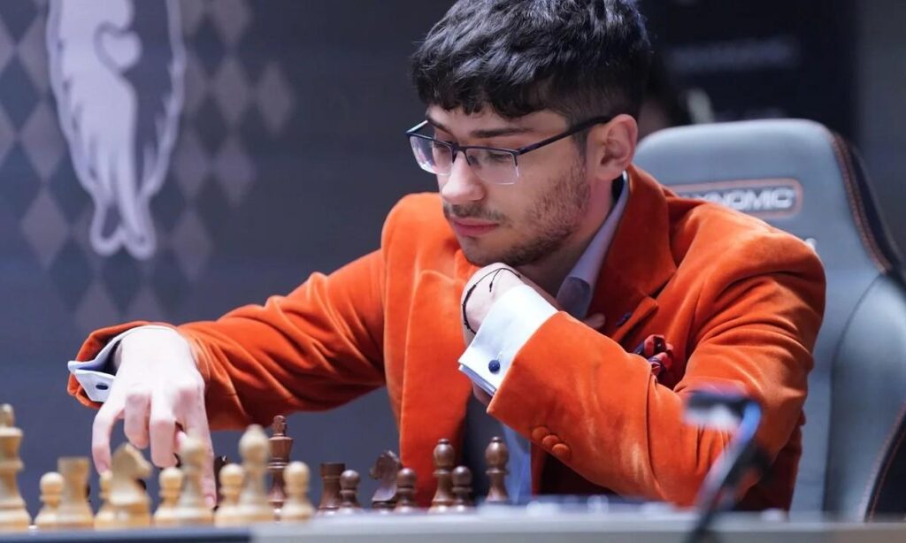 Firouzja playing tactical chess game representing france in top 10 rankings.